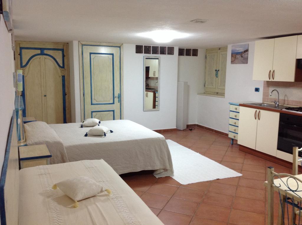 Addisora Appartamenti Cala Liberotto Quarto foto